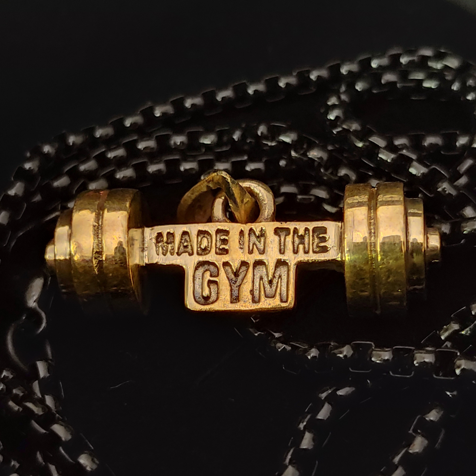 Made in the GYM pendant with branded packaging and card – premium unboxing experience for fitness lovers.