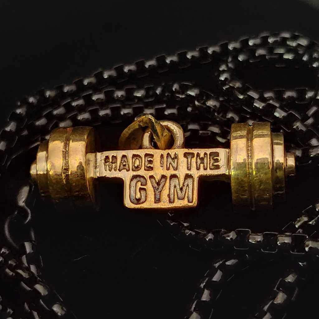 Made in the GYM pendant with branded packaging and card – premium unboxing experience for fitness lovers.